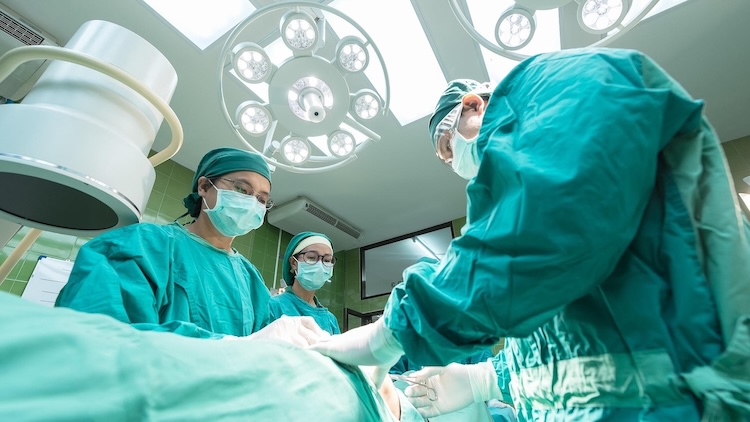 Surgeons using medical devices during a surgery
